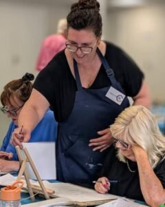 Basingstoke tutor giving instruction to happy student.