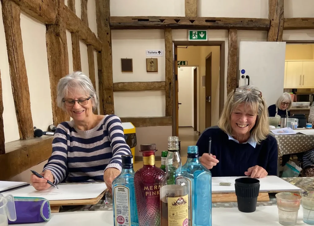 Horsham duo having fun painting at our art class.